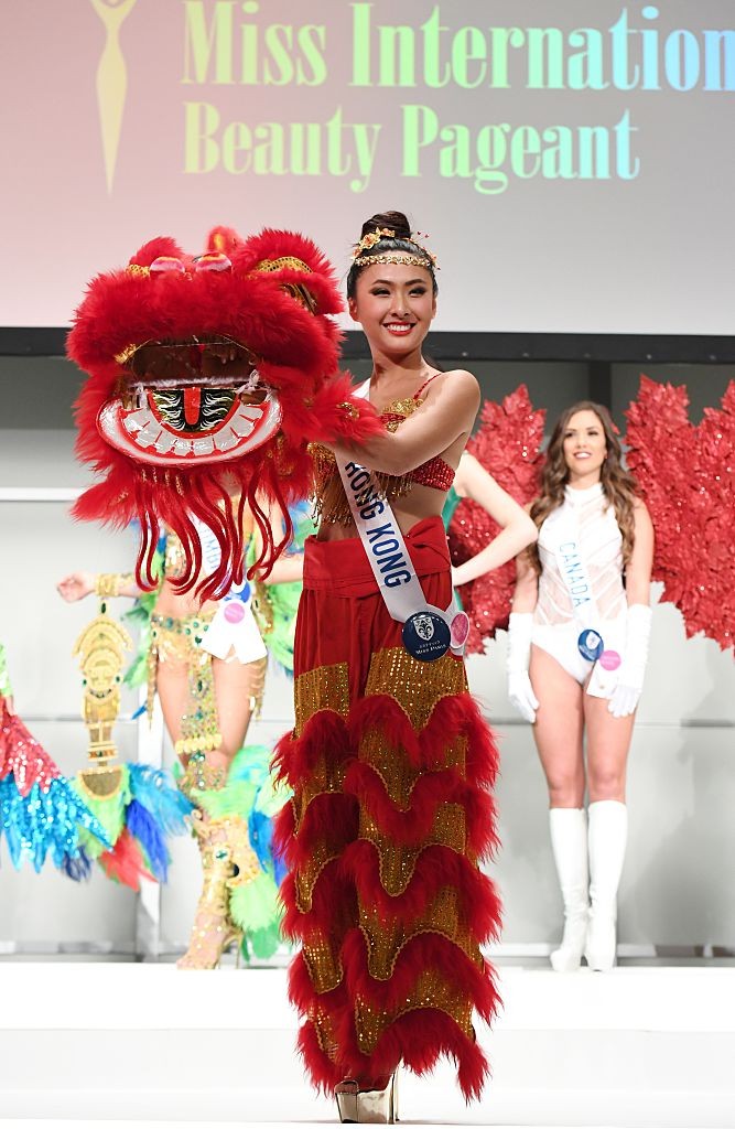 Miss Hong Kong Kelly Yeuk Lam Chan poses in her national costume during the opening press preview of 2016 Miss International Beauty Pageant in Tokyo on October 11, 2016.Seventy women will compete in the final in Tokyo on October 27. / AFP / TOSHIFUMI KITAMURA        (Photo credit should read TOSHIFUMI KITAMURA/AFP/Getty Images)