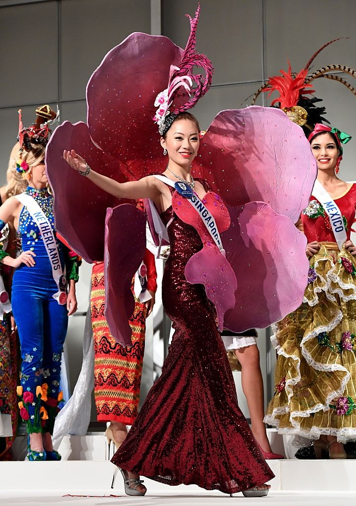 Miss Singapore Huiqi Wang displays her national costume during the opening press preview of 2016 Miss International Beauty Pageant in Tokyo on October 11, 2016.Seventy women will compete in the final in Tokyo on October 27. / AFP / TOSHIFUMI KITAMURA        (Photo credit should read TOSHIFUMI KITAMURA/AFP/Getty Images)